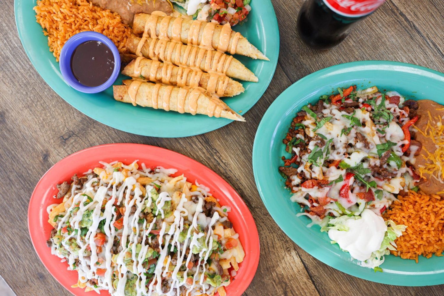 Flautas, Alambre Tacos and Nacho Fries at Jalapenos in Sparks at a table