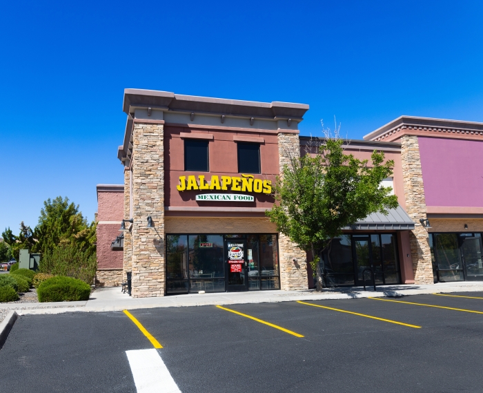 The Jalapenos building, on the corner in the Shoppers Square shopping center.